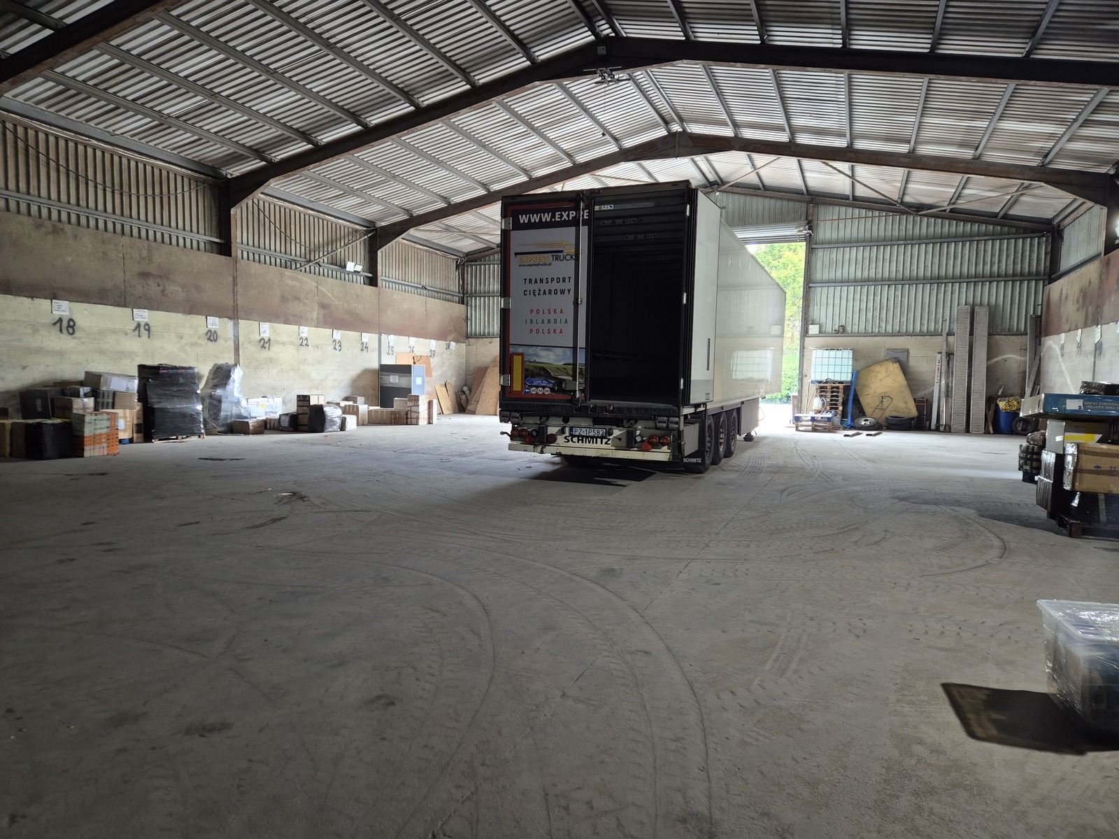 Express Trucks refrigerated trailer with open doors at the depot